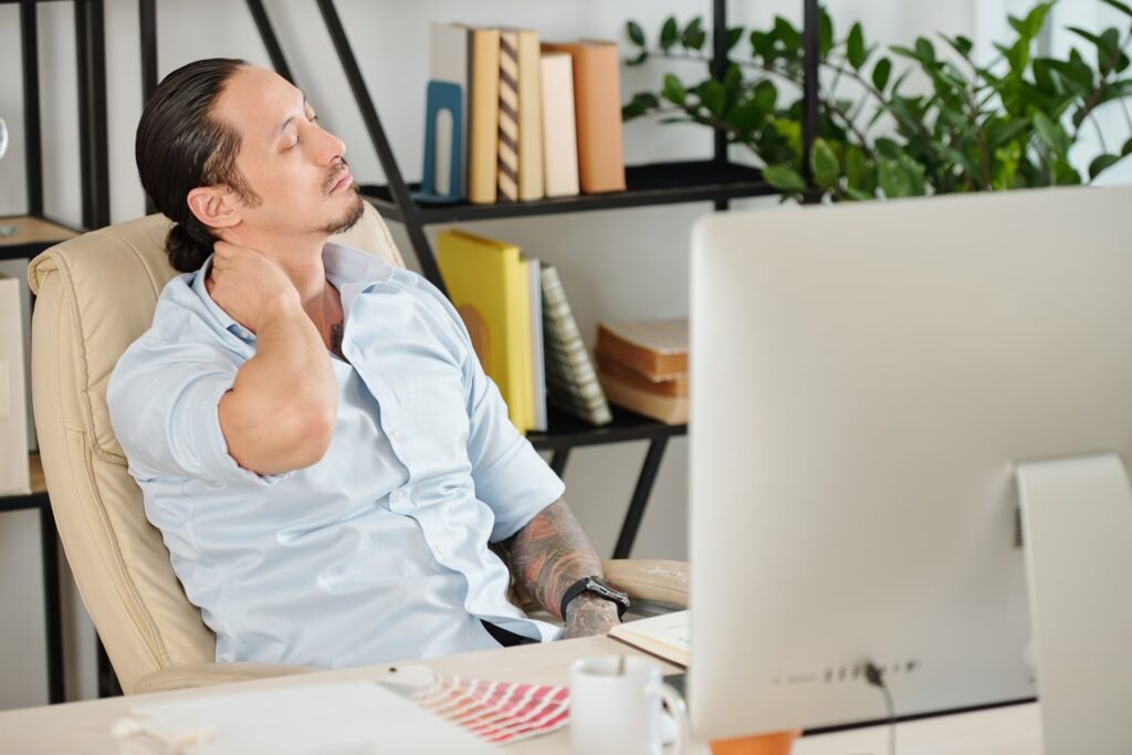 designer massaging tensed muscles 2025 02 11 13 59 34 utc 1 converted